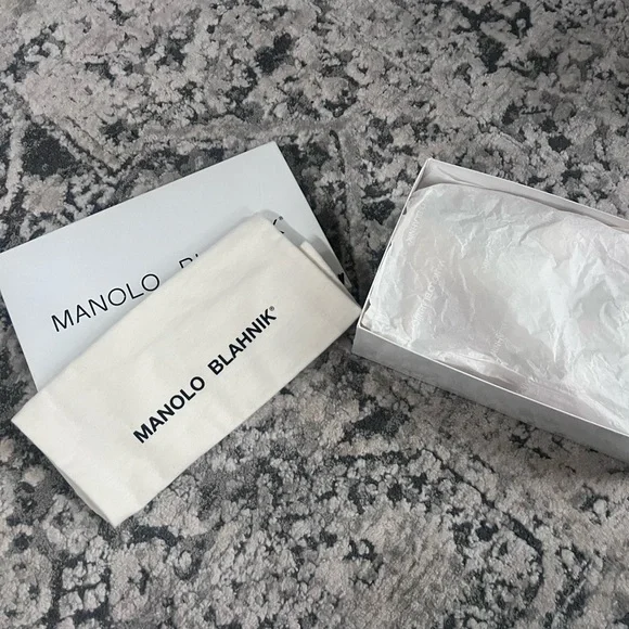 Manolo sandals size 41/11 in white.Perfect condition-comes with box and dust bag